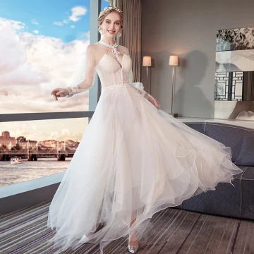 Moderne Mode Été Transparentes Ivoire Plage Robe De Mariée 2018 Princesse Col Haut Manches Longues Dos Nu Appliques En Dentelle Volants Longueur Cheville