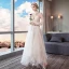 Modern / Fashion Summer See-through Ivory Beach Wedding Dresses 2018 A-Line / Princess High Neck Long Sleeve Backless Appliques Lace Ruffle Ankle Length
