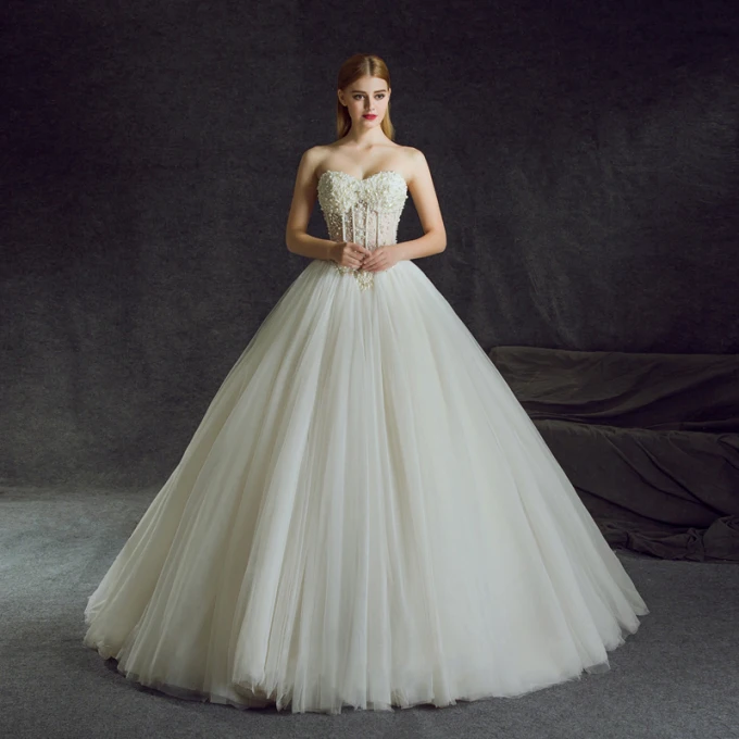 Illusjon Elfenben Boret Brudekjoler 2018 Ballkjole Kjæreste Uten Ermer Ryggløse Beading Perle Rhinestone Buste Chapel Train