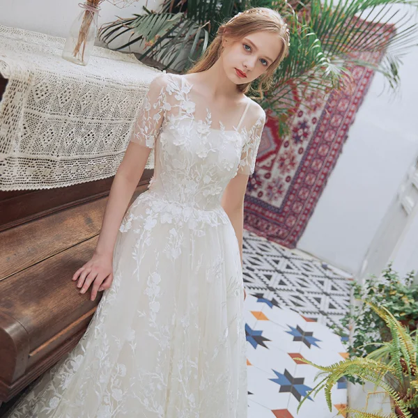 Chic / Beautiful Champagne Beach Pierced Wedding Dresses 2018 A-Line / Princess Scoop Neck Short Sleeve Backless Appliques Lace Ruffle Court Train