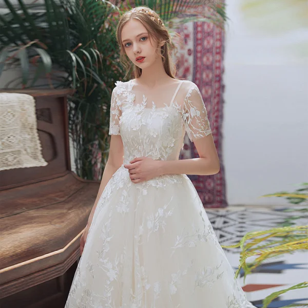 Chic / Beautiful Champagne Beach Pierced Wedding Dresses 2018 A-Line / Princess Scoop Neck Short Sleeve Backless Appliques Lace Ruffle Court Train