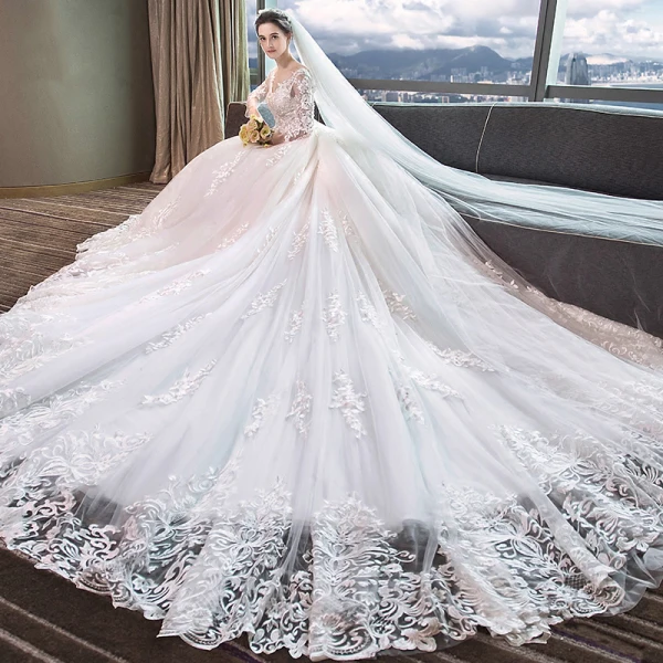 Chic / Belle Blanche Percé Robe De Mariée 2018 Princesse V-Cou Manches Longues Dos Nu Appliques En Dentelle Volants Cathedral Train