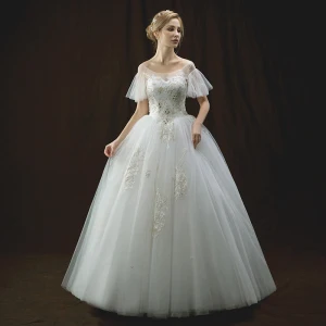 Chic Beautiful Ivory Wedding Dresses 2018 Ball Gown See Through Scoop Neck Short Sleeve Backless Appliques Lace Rhinestone Beading Floor Length Long Ruffle