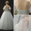 Chic / Beautiful Ivory Wedding Dresses 2018 Ball Gown See-through Scoop Neck Short Sleeve Backless Appliques Lace Rhinestone Beading Floor-Length / Long Ruffle