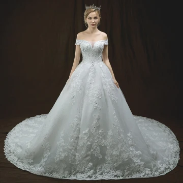 Luxe Ivoire Robe De Mariée 2018 Princesse De L Épaule Manches Courtes Dos Nu Appliques En Dentelle Glitter Paillettes Perlage Cathedral Train Volants