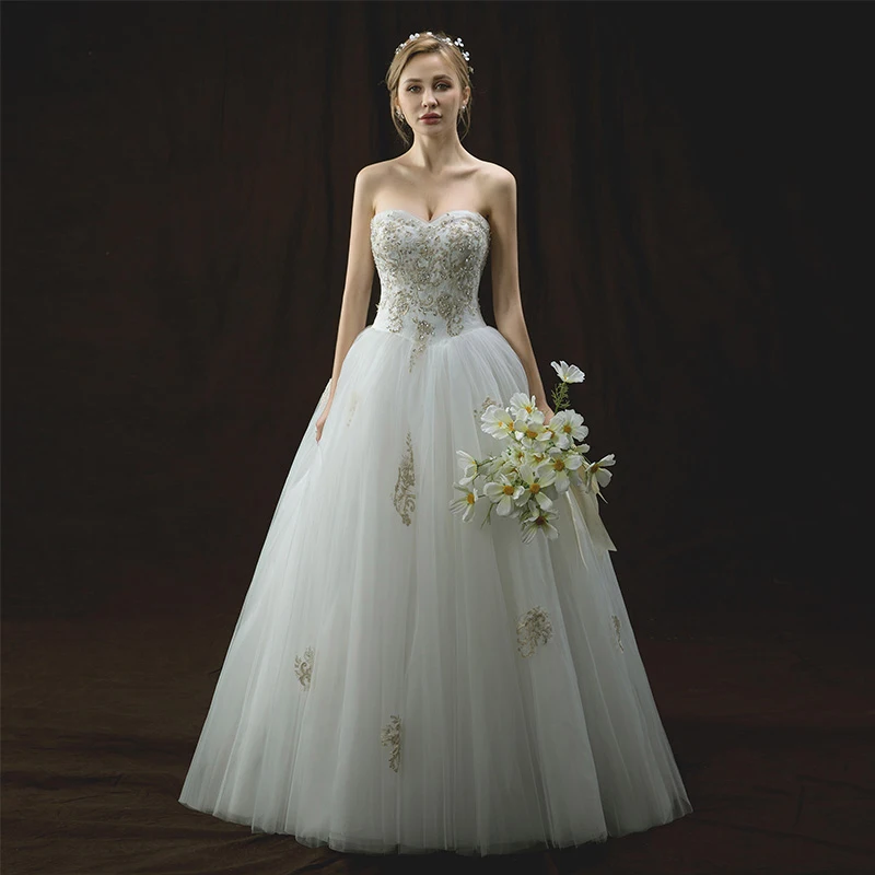 Fine Elfenben Brudekjoler 2018 Prinsesse Kjæreste Uten Ermer Ryggløse Gull Appliques Blonder Paljetter Perle Lange Buste