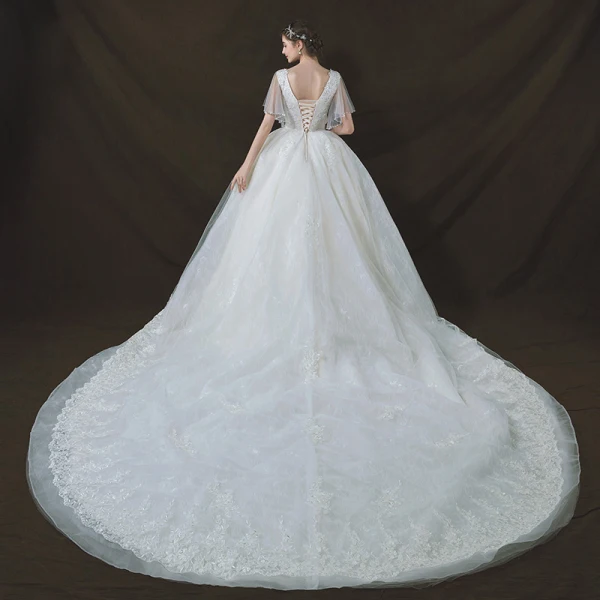 Chic / Belle Ivoire Robe De Mariée 2018 Robe Boule Transparentes V-Cou Manches Courtes Dos Nu Appliques En Dentelle Paillettes Perle Royal Train Volants