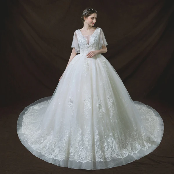 Chic / Belle Ivoire Robe De Mariée 2018 Robe Boule Transparentes V-Cou Manches Courtes Dos Nu Appliques En Dentelle Paillettes Perle Royal Train Volants