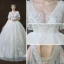 Chic / Belle Ivoire Robe De Mariée 2018 Robe Boule Transparentes V-Cou Manches Courtes Dos Nu Appliques En Dentelle Paillettes Perle Royal Train Volants