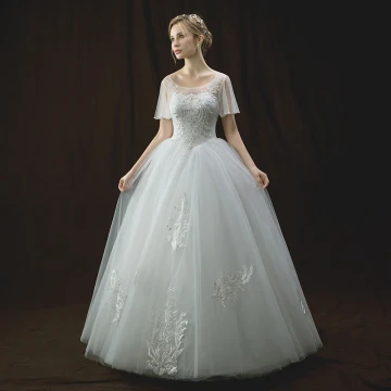 Chic Belle Ivoire Transparentes Robe De Mariée 2018 Robe Boule Encolure Dégagée Manches Courtes Dos Nu Appliques En Dentelle Paillettes Perle Perlage Longue Volants