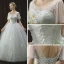 Chic / Belle Ivoire Transparentes Robe De Mariée 2018 Robe Boule Encolure Dégagée Manches Courtes Dos Nu Appliques En Dentelle Paillettes Perle Perlage Longue Volants