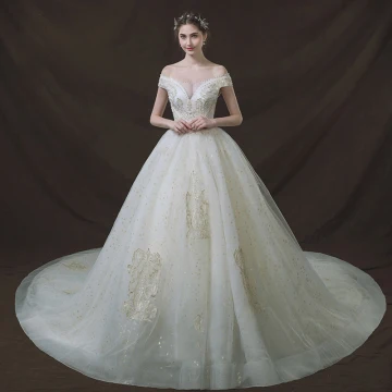 Bling Bling Ivoire Robe De Mariée 2018 Robe Boule De L Épaule Transparentes V Cou Manches Courtes Dos Nu Glitter Étoile Appliques En Dentelle Perle Perlage Cathedral Train Volants