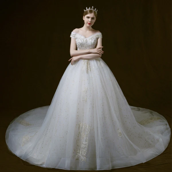 Bling Bling Ivoire Robe De Mariée 2018 Robe Boule De l'épaule Manches Courtes Dos Nu Étoile Appliques En Dentelle Perle Perlage Cathedral Train Volants