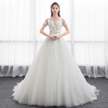 Illusion Ivoire Percé Robe De Mariée 2018 Princesse Encolure Dégagée Manches Courtes Appliques En Dentelle Volants Chapel Train