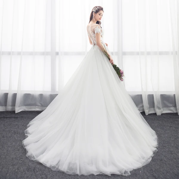 Illusion Ivory Pierced Wedding Dresses 2018 A-Line / Princess Scoop Neck Short Sleeve Appliques Lace Ruffle Chapel Train