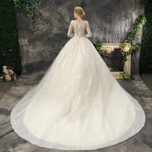 Romantisk Fine Kirke Brudekjoler 2017 Blonder Appliques Perle Paljetter Ryggløse Langermede Scoop Halsen Cathedral Train Champagne Ballkjole
