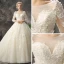 Romantic Chic / Beautiful Church Wedding Dresses 2017 Lace Appliques Pearl Sequins Backless Long Sleeve Scoop Neck Cathedral Train Champagne Ball Gown