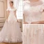 Chic / Belle Champagne Robe De Mariée 2018 Princesse Transparentes Perle Encolure Dégagée Manches Courtes Dos Nu Appliques En Dentelle Paillettes Volants Cathedral Train