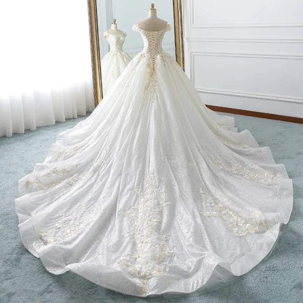 Luxury / Gorgeous Champagne Wedding Dresses 2018 Ball Gown Off-The-Shoulder Short Sleeve Backless Appliques Lace Glitter Tulle Ruffle Cathedral Train