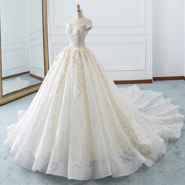 Luxury / Gorgeous Champagne Wedding Dresses 2018 Ball Gown Off-The-Shoulder Short Sleeve Backless Appliques Lace Glitter Tulle Ruffle Cathedral Train