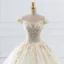 Luxury / Gorgeous Champagne Wedding Dresses 2018 Ball Gown Off-The-Shoulder Short Sleeve Backless Appliques Lace Glitter Tulle Ruffle Cathedral Train