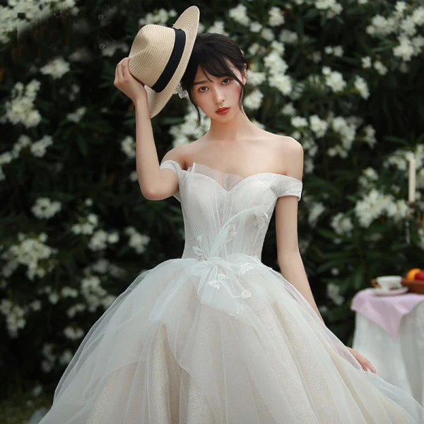 High-end Champagne Wedding Dresses 2019 Ball Gown Off-The-Shoulder Lace Flower Sleeveless Backless Royal Train