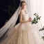 Charming Champagne Wedding Dresses 2020 Ball Gown Ruffle V-Neck Beading Pearl Lace Appliques Sequins Sleeveless Backless Royal Train