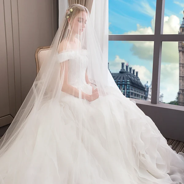 Elegant Ivory Wedding Dresses 2018 Ball Gown Lace Cascading Ruffles Off-The-Shoulder Backless Sleeveless Royal Train Wedding