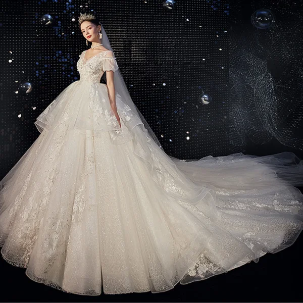 High-end Ivory Wedding Dresses 2020 Ball Gown V-Neck Beading Pearl Sequins Lace Flower Appliques Short Sleeve Backless Royal Train