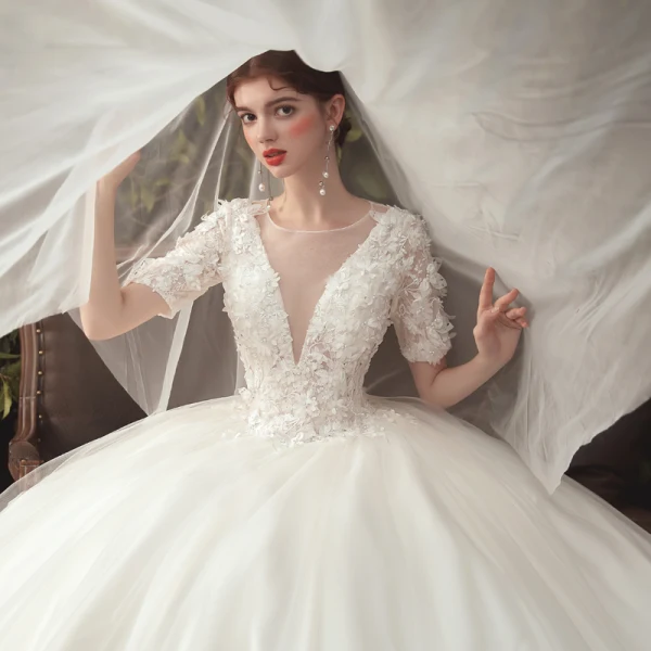 Elegant Ivory Wedding Dresses 2020 Ball Gown Deep V-Neck Pearl Lace Flower Appliques Short Sleeve Backless Cathedral Train