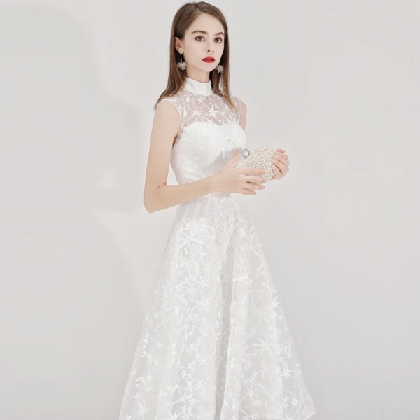 Abordable Ivoire de retour Robe De Graduation 2020 Princesse Col Haut Étoile En Dentelle Sans Manches Thé Longueur Robe De Ceremonie