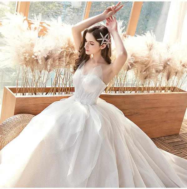 Charming Ivory Wedding Dresses 2020 Ball Gown Strapless Rhinestone Lace Flower Sleeveless Backless Royal Train