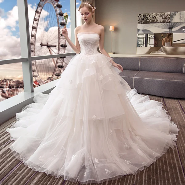 Elegant Ivory Wedding Dresses 2018 Ball Gown Lace Flower Pearl Cascading Ruffles Strapless Backless Sleeveless Royal Train Wedding