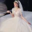 High-end Ivory Lace Flower Wedding Dresses 2020 Ball Gown Scoop Neck Beading Pearl Short Sleeve Covered Button Cathedral Train