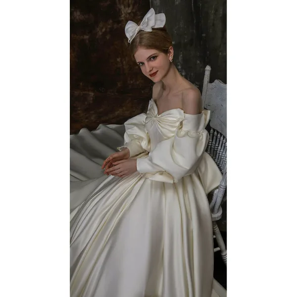 High-end Ivory Bow Satin Wedding Dresses 2022 Ball Gown Off-The-Shoulder Puffy Long Sleeve Backless Royal Train Wedding