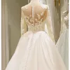 Amazing / Unique White Wedding Dresses 2017 Scoop Neck Satin Lace Ruffle Appliques Backless Long Sleeve Covered Button Chapel Train Ball Gown