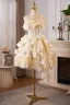 Elegant Champagne Cascading Ruffles Appliques Satin Party Dresses 2024 Ball Gown Spaghetti Straps Sleeveless Backless Knee-Length Formal Dresses