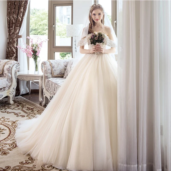 Charmant Champagne Robe De Mariée 2019 Princesse Perlage Cristal Perle Paillettes Bustier Dos Nu Sans Manches Longue
