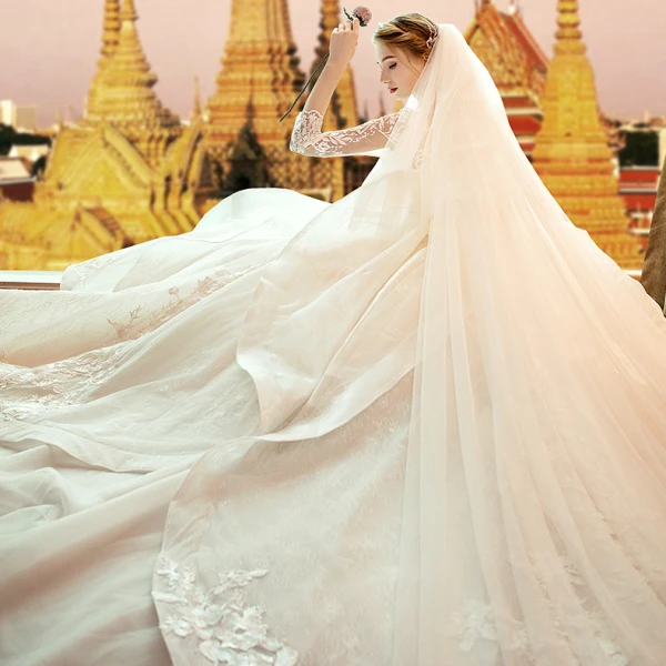 Audrey Hepburn Style Champagne Wedding Dresses 2019 Ball Gown See-through Scoop Neck Lace Appliques 3/4 Sleeve Backless Cascading Ruffles Royal Train