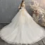 Charmant Champagne Robe De Mariée 2019 Princesse Bustier Noeud Sans Manches Dos Nu Cathedral Train