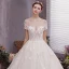 Charmant Ivoire Robe De Mariée 2019 Princesse Encolure Dégagée Perlage Appliques Manches Courtes Dos Nu Cathedral Train