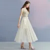Sparkly Champagne Summer Homecoming Graduation Dresses 2018 A-Line / Princess Shoulders Sleeveless Sequins Bow Sash Spotted Tea-length Ruffle Backless Formal Dresses
