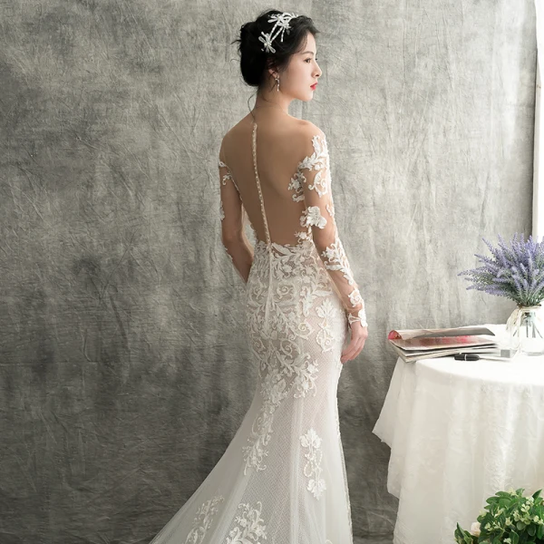 Charmant Ivory / Creme Durchsichtige Brautkleider / Hochzeitskleider 2018 Meerjungfrau Rundhalsausschnitt Lange Ärmel Applikationen Durchbohrt Spitze Kapelle-Schleppe