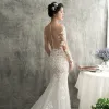 Charming Ivory See-through Wedding Dresses 2018 Trumpet / Mermaid Scoop Neck Long Sleeve Appliques Pierced Lace Chapel Train