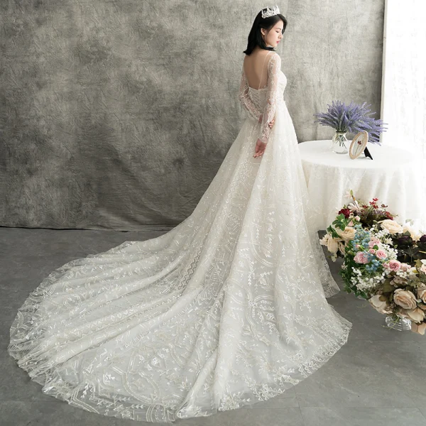 Luxury / Gorgeous Champagne See-through Wedding Dresses 2018 Trumpet / Mermaid Scoop Neck Long Sleeve Backless Beading Detachable Chapel Train