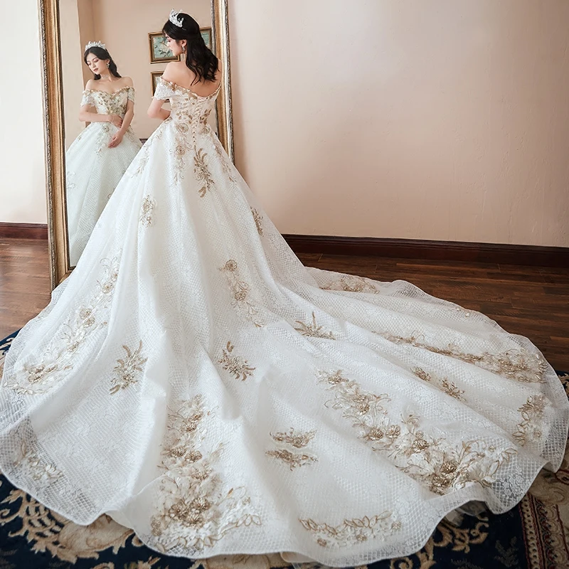 Chic Beautiful White Wedding Dresses 2018 Ball Gown Off The Shoulder Short  Sleeve Backless Appliques Lace Rhinestone Cathedral Train Ruffle