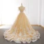 Élégant Champagne Robe De Bal 2018 Princesse Transparentes Encolure Dégagée Manches Courtes Appliques En Dentelle Tribunal Train Volants Dos Nu Robe De Ceremonie