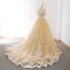 Élégant Champagne Robe De Bal 2018 Princesse Transparentes Encolure Dégagée Manches Courtes Appliques En Dentelle Tribunal Train Volants Dos Nu Robe De Ceremonie