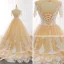 Élégant Champagne Robe De Bal 2018 Princesse Transparentes Encolure Dégagée Manches Courtes Appliques En Dentelle Tribunal Train Volants Dos Nu Robe De Ceremonie
