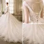 Elegante Ivory / Creme Durchsichtige Brautkleider 2018 A Linie Rundhalsausschnitt Ärmel Rückenfreies Applikationen Mit Spitze Perle Kristall Perlenstickerei Kapelle-Schleppe Rüschen